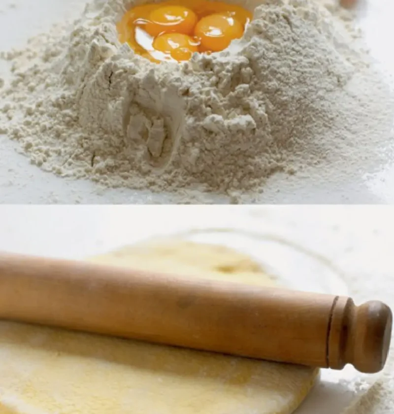 Fresh egg pasta dough: eggs in a well of flour, and a dough sheet being rolled with a wooden rolling pin