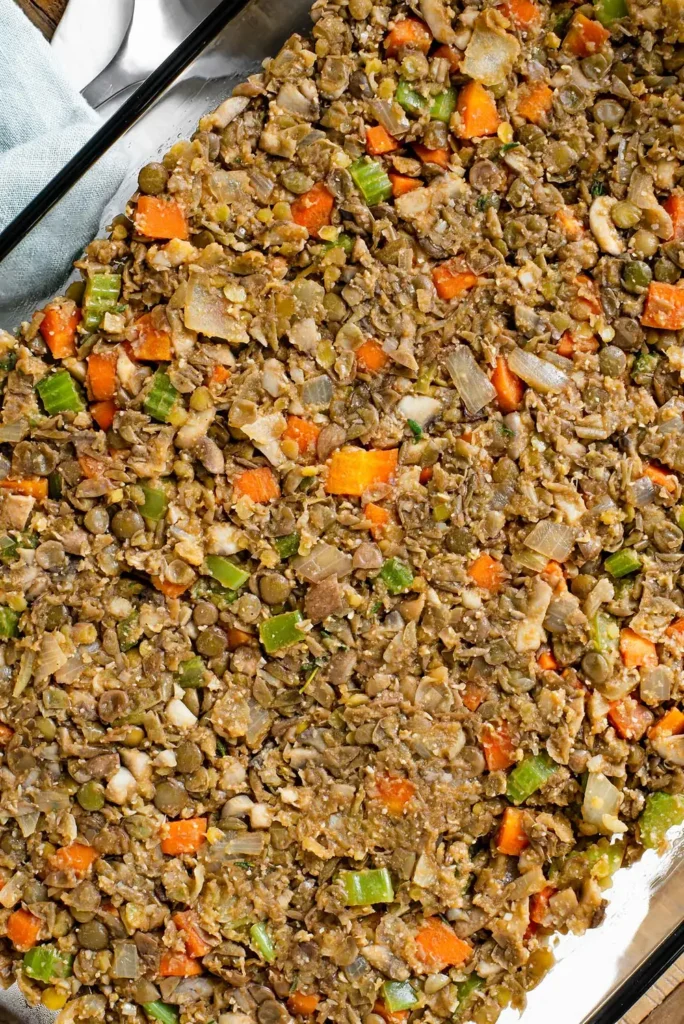 Lentil filling pressed into a glass baking dish
